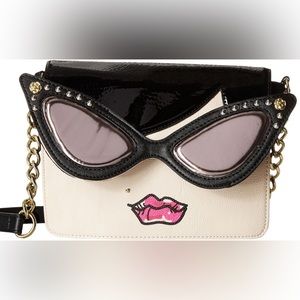 Vintage black Betsey Johnson abstract retro face crossbody bag.